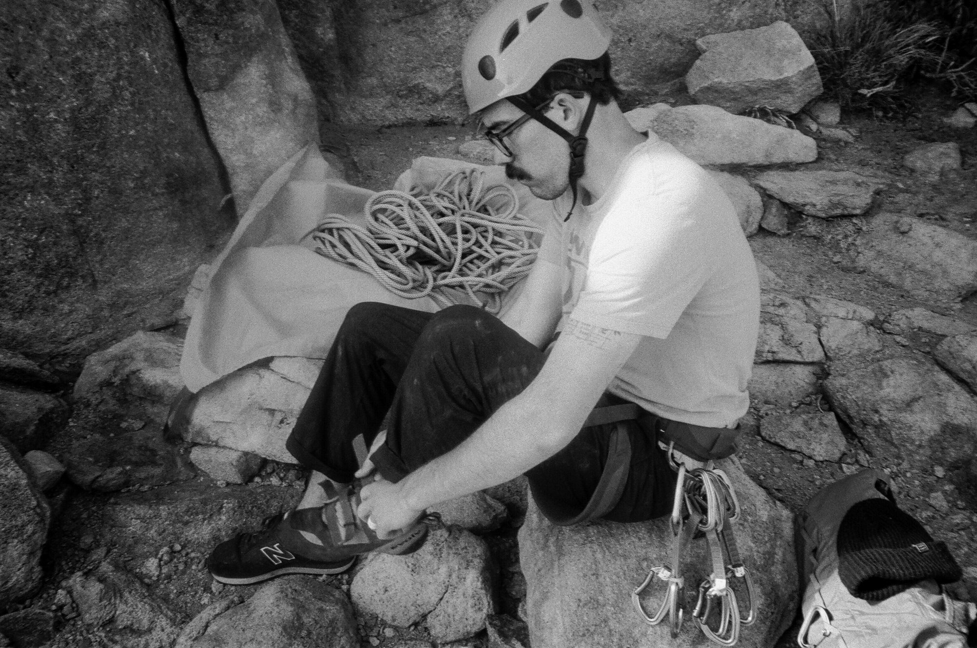 Caleb putting on his Evolv Sharmas