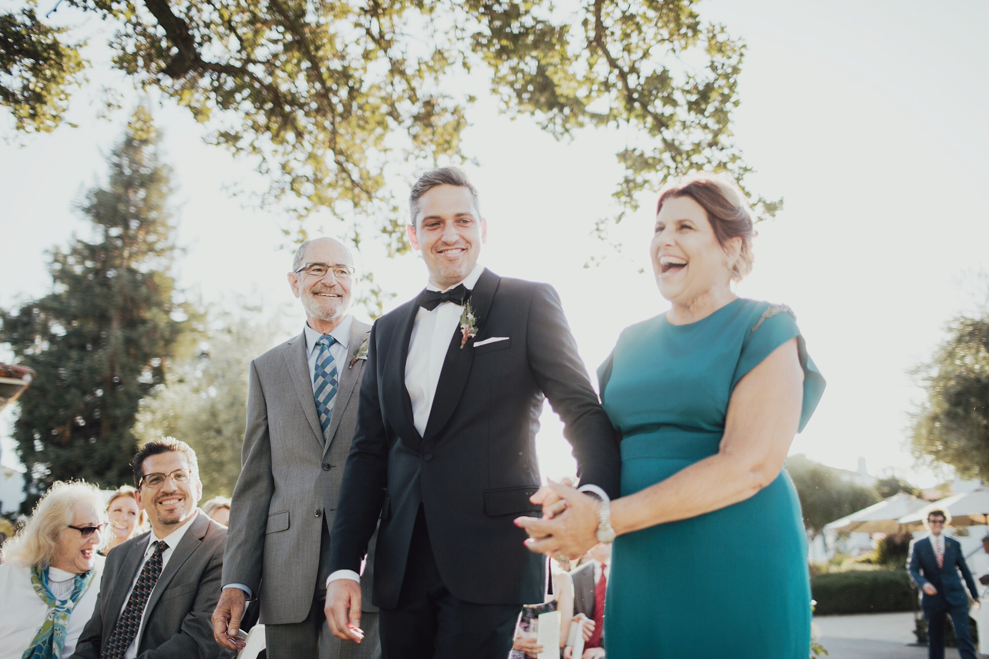 Andy walking his parents down the aisle