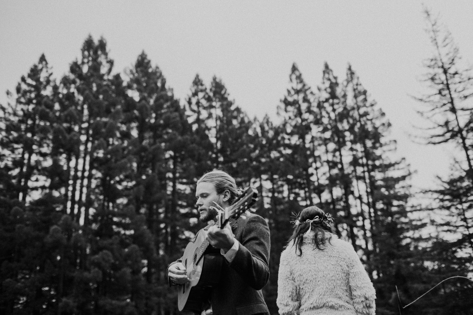 groom singing to bride on wedding day